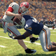 Illustration for article titled A Blindside Hit Takes Down an NCAA Football Team Rallying to the End